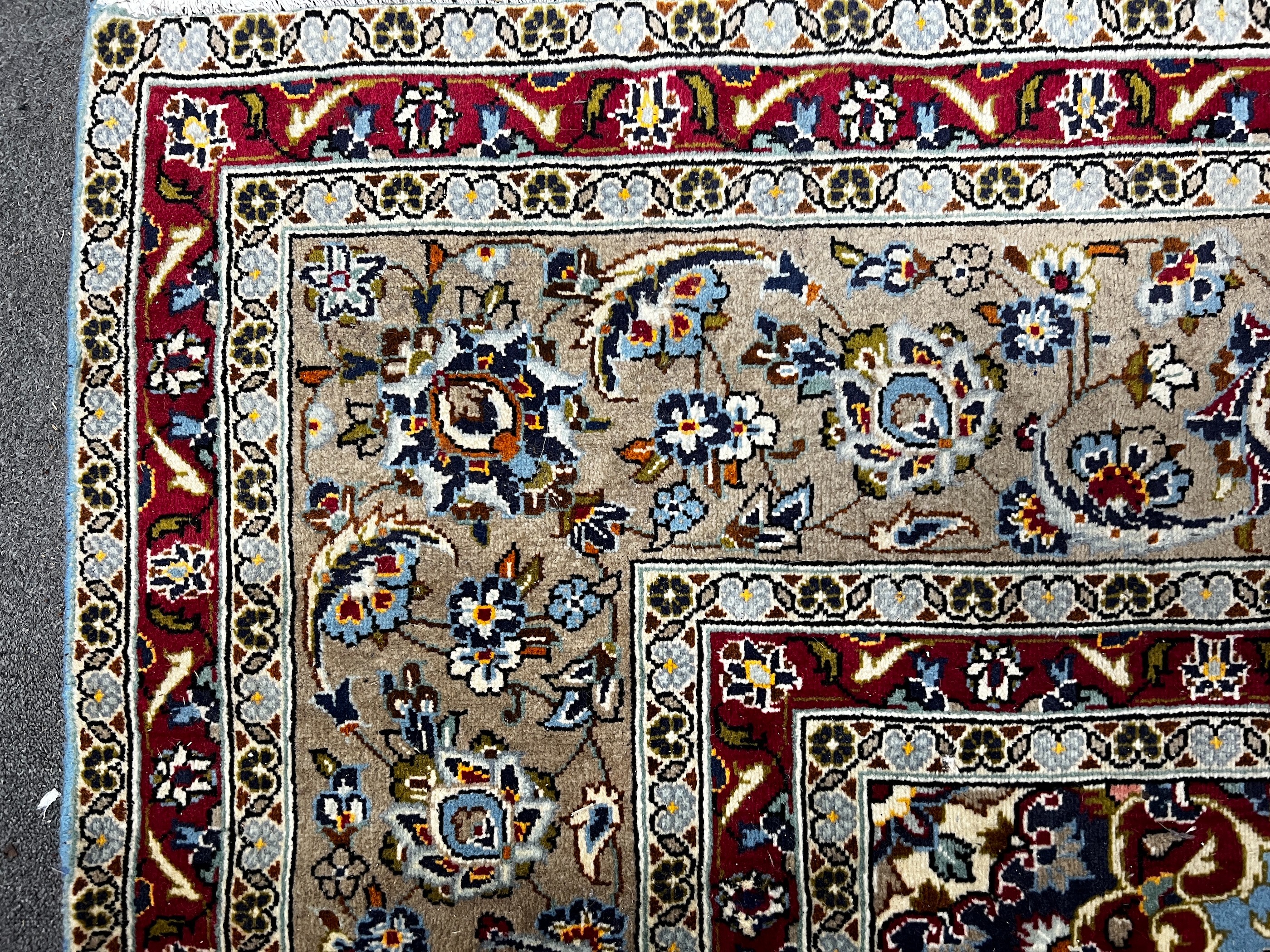 A Kashan blue ground carpet, 242 x 242cm